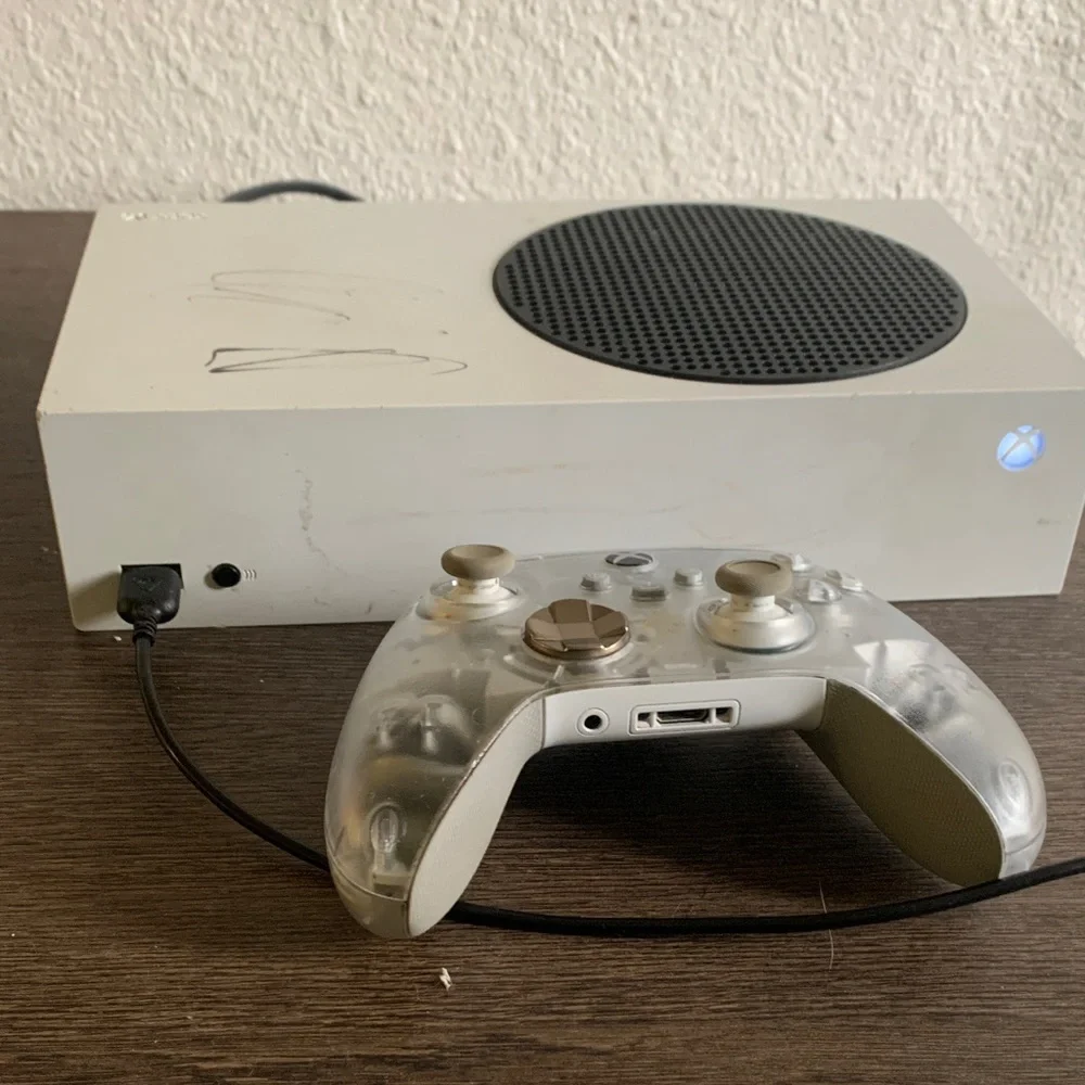 Sleek White Gaming Console with Controller